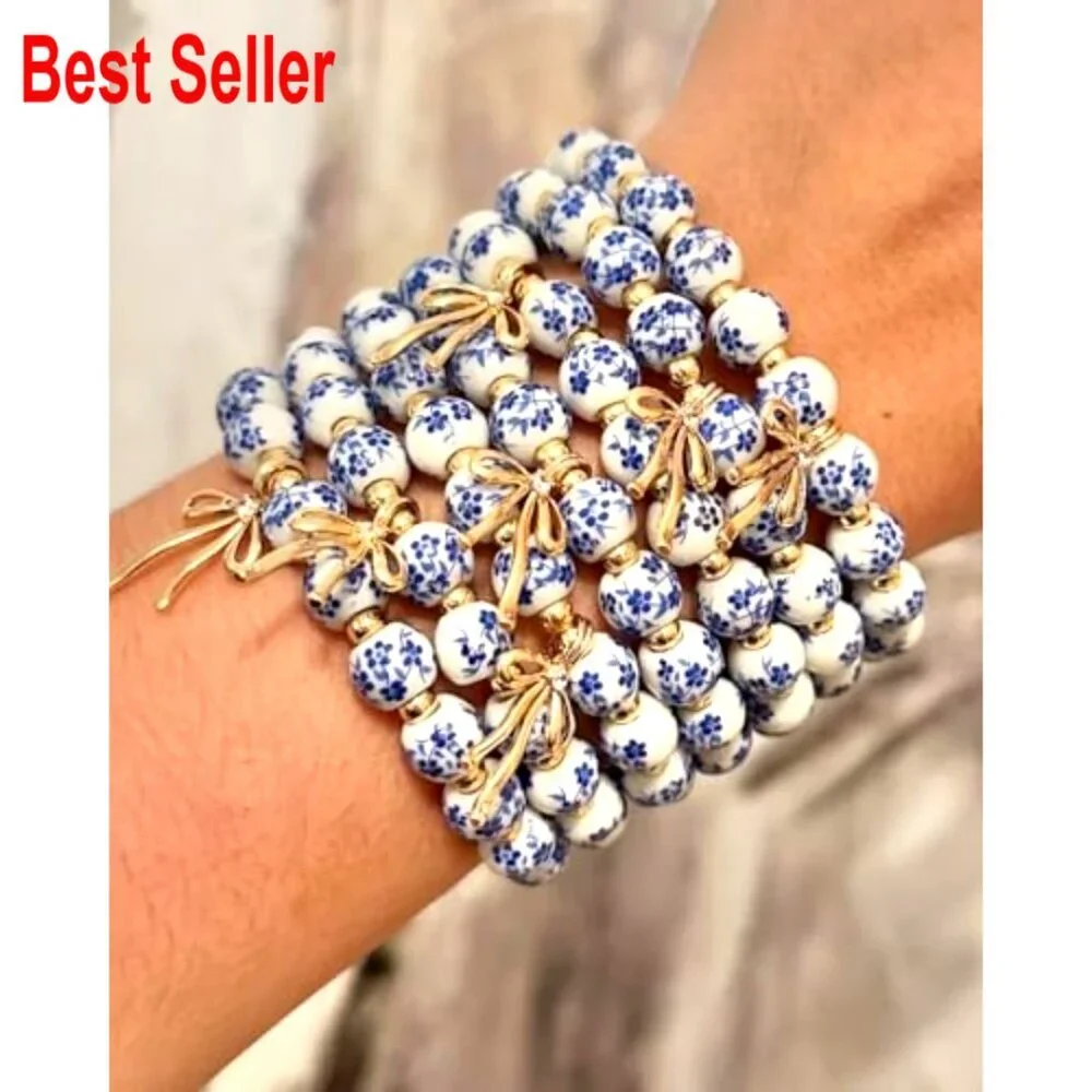 Handmade Stretch Beaded Bracelet with Gold Plated Bow Charm
